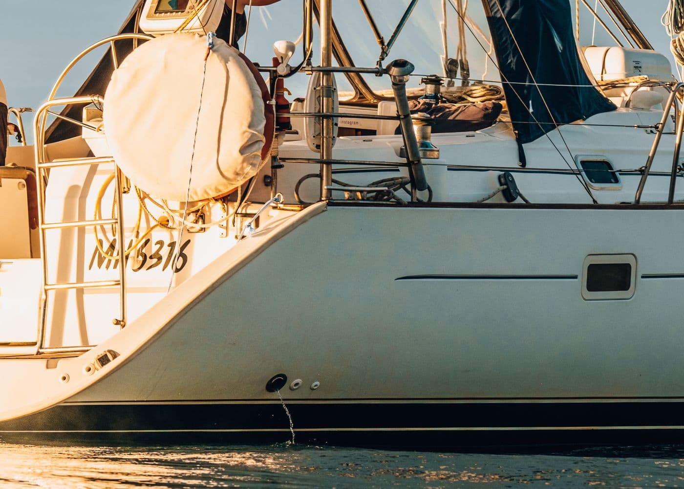 A sailing yacht at golden hour
